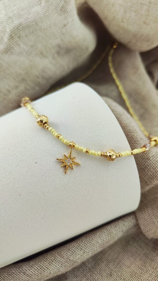 Collier Whitsunday avec perles jaunes et breloque étoile dorée sertie de zirconium