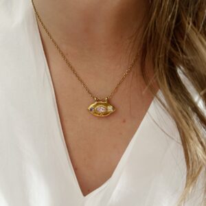 Collier Kea en acier inoxydable doré avec pendentif œil serti de strass roses.
